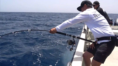 Angler working the GTV 86 from a boat